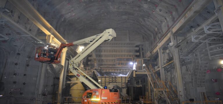 Cadia Ground Support - Operators removing infrastructure ready for ground support installations in Panel Cave 1 crusher chamber