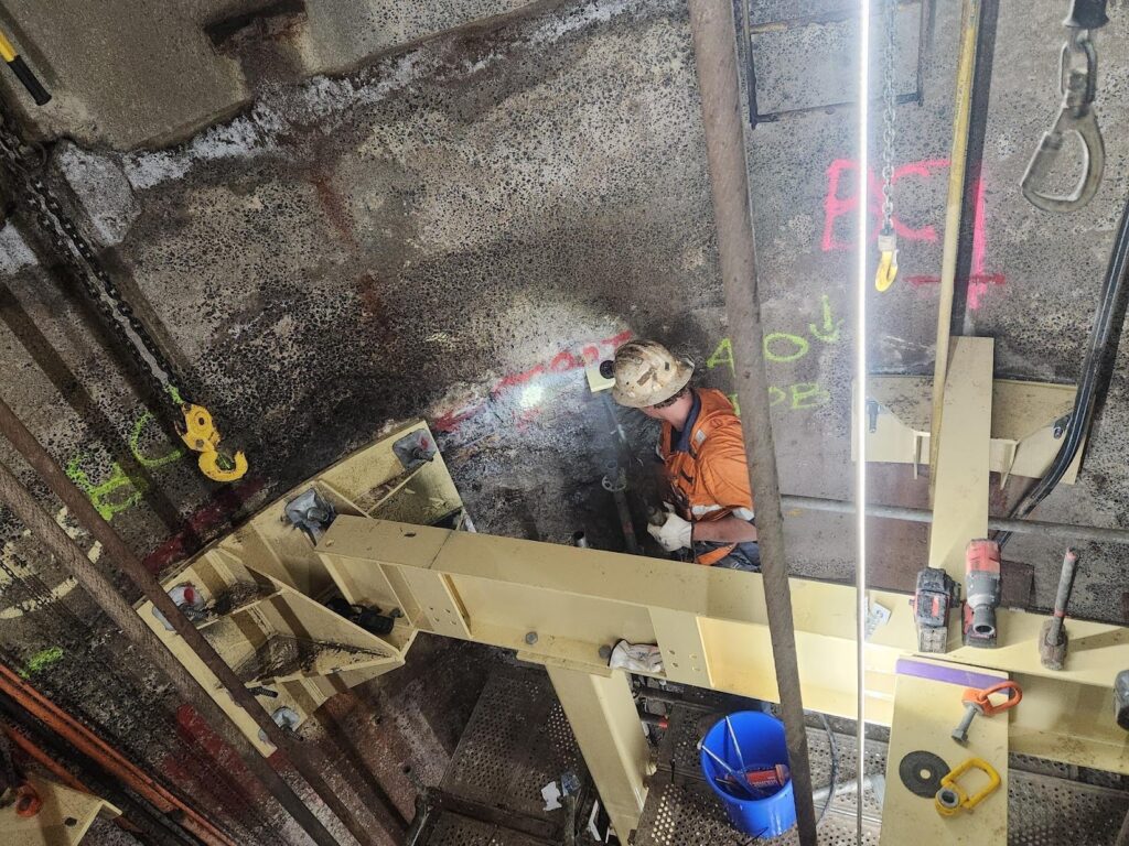 Mine worker in Underground mine shaft - Shaft Steel Replacement - Job Report 2024