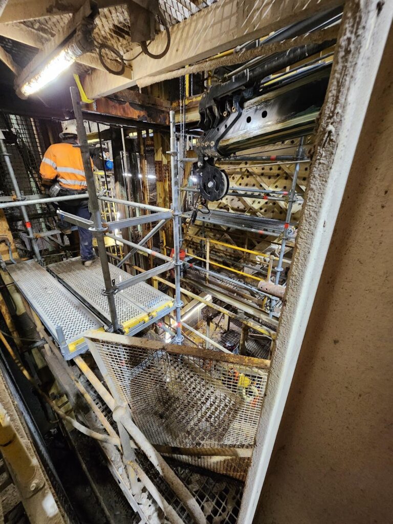 a metal scaffolding in a room - Shaft Steel Replacement - Job Report 2024